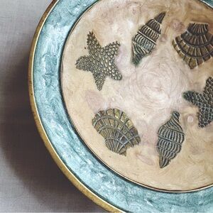 Vintage brass painted trinket dish with seashells and starfish
